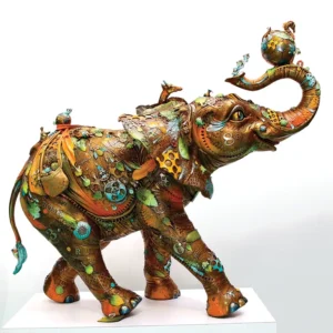 Colorful elephant sculpture with surface decorations of circus imagery by Bobby Nano Lopez.