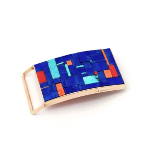 Charles Loloma buckle in gold and mosaic inlaid lapis, coral and turquouise seen from the front.