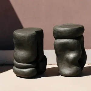 Black organic slumped clay forms.